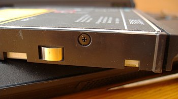 unscrew other screws of Ultrabay 2000 cover