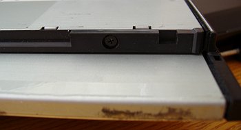 unscrew other screws of Ultrabay 2000 cover