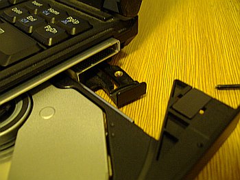 you must have opened new drive before mounting inside notebook (or you can remove front cover of tray), otherwise you won't set drive in position because of Ultrabay 2000 ejecting mechanism